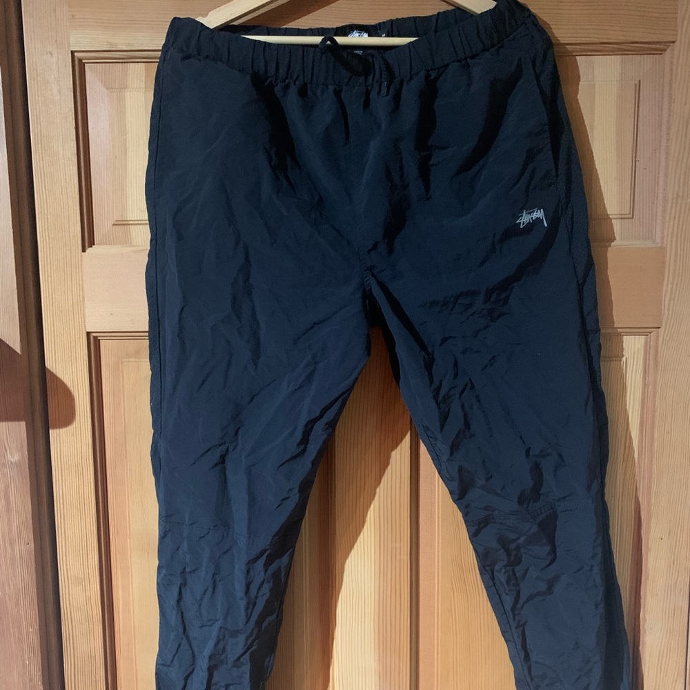 Vintage Stussy pants with reflective logo